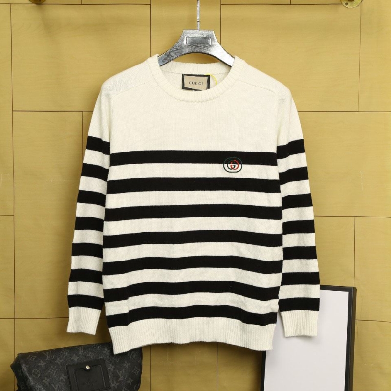 G*u*i sweaters